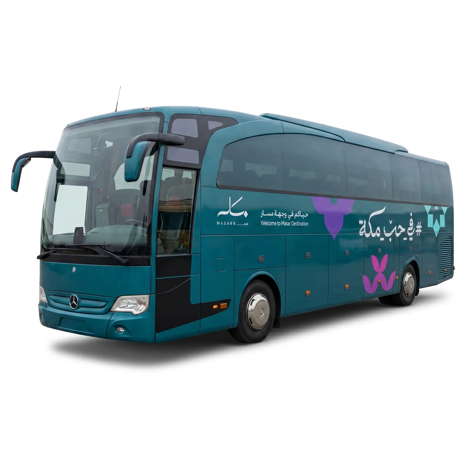 A Masar Destination coach in a full wrap: teal base, purple accents and the Makkah campaign line, applied panel by panel.